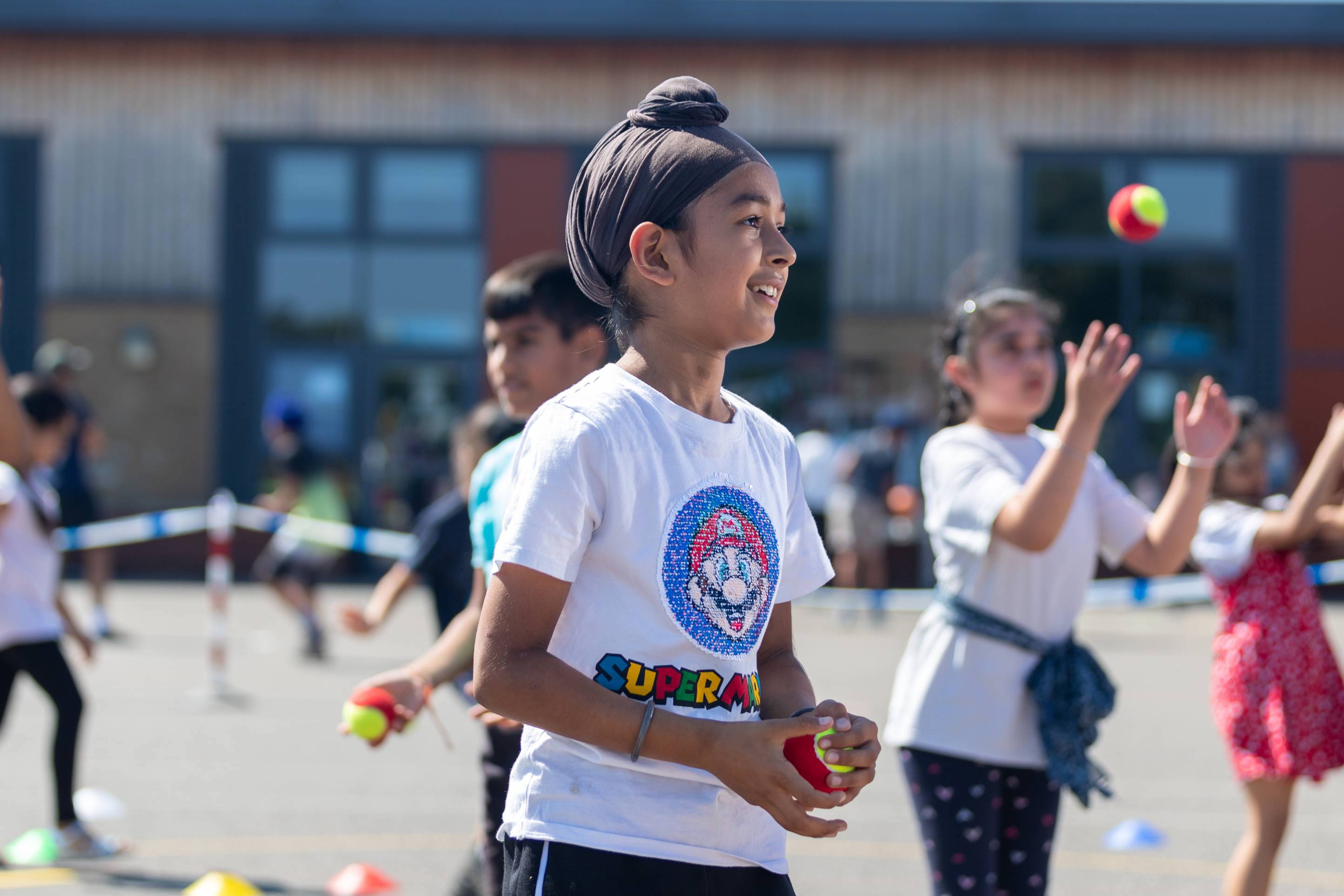 Child taking part in an LTA SERVES session