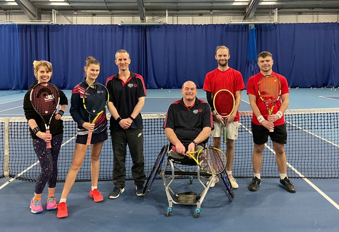Coach Paul Singleton pictured alongside the Special Olympics Great Britain squad at Grantham Tennis Club