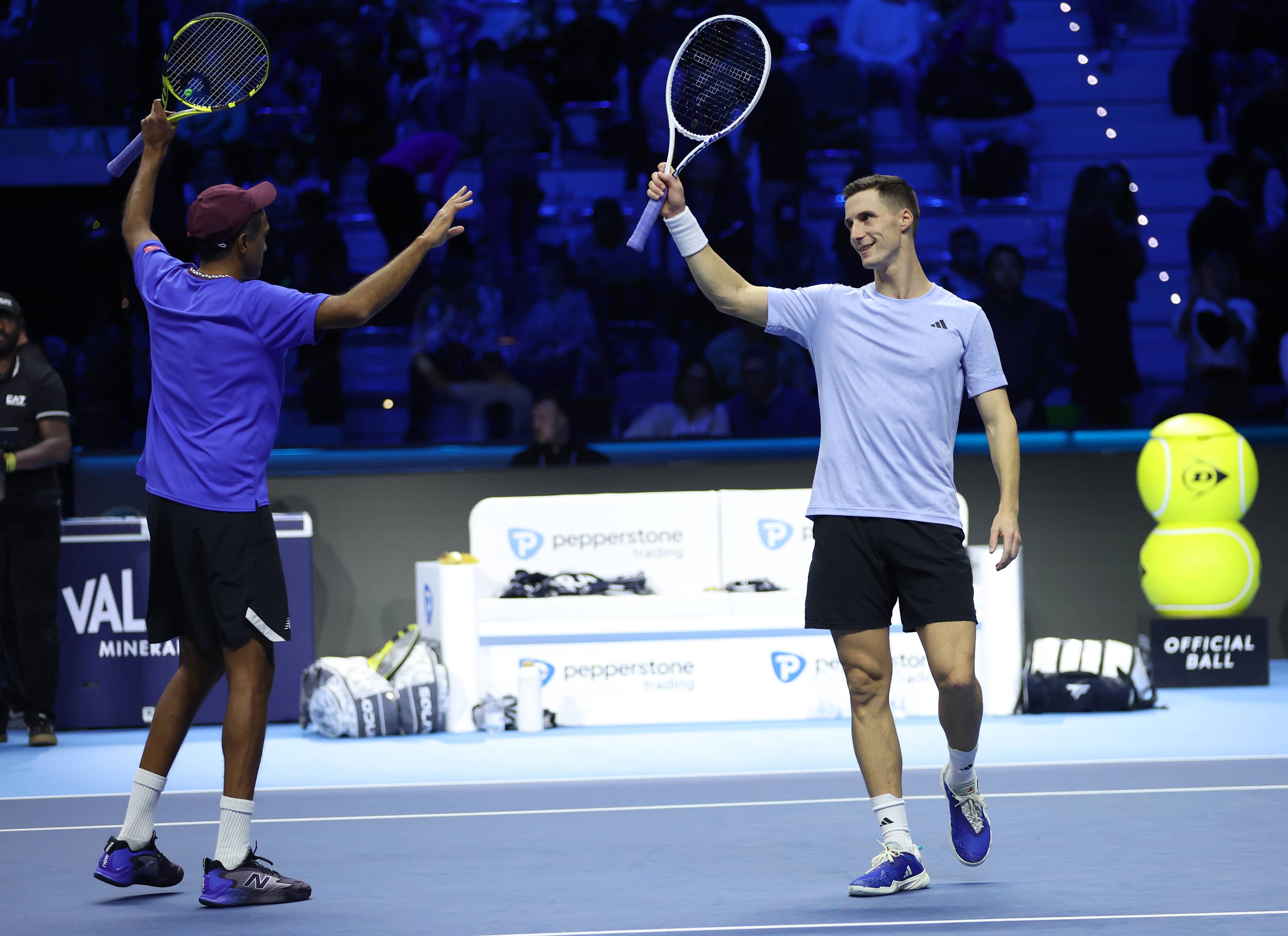 Joe Salisbury and Rajeev Ram celebarte winning a match at the Nitto ATP Finals