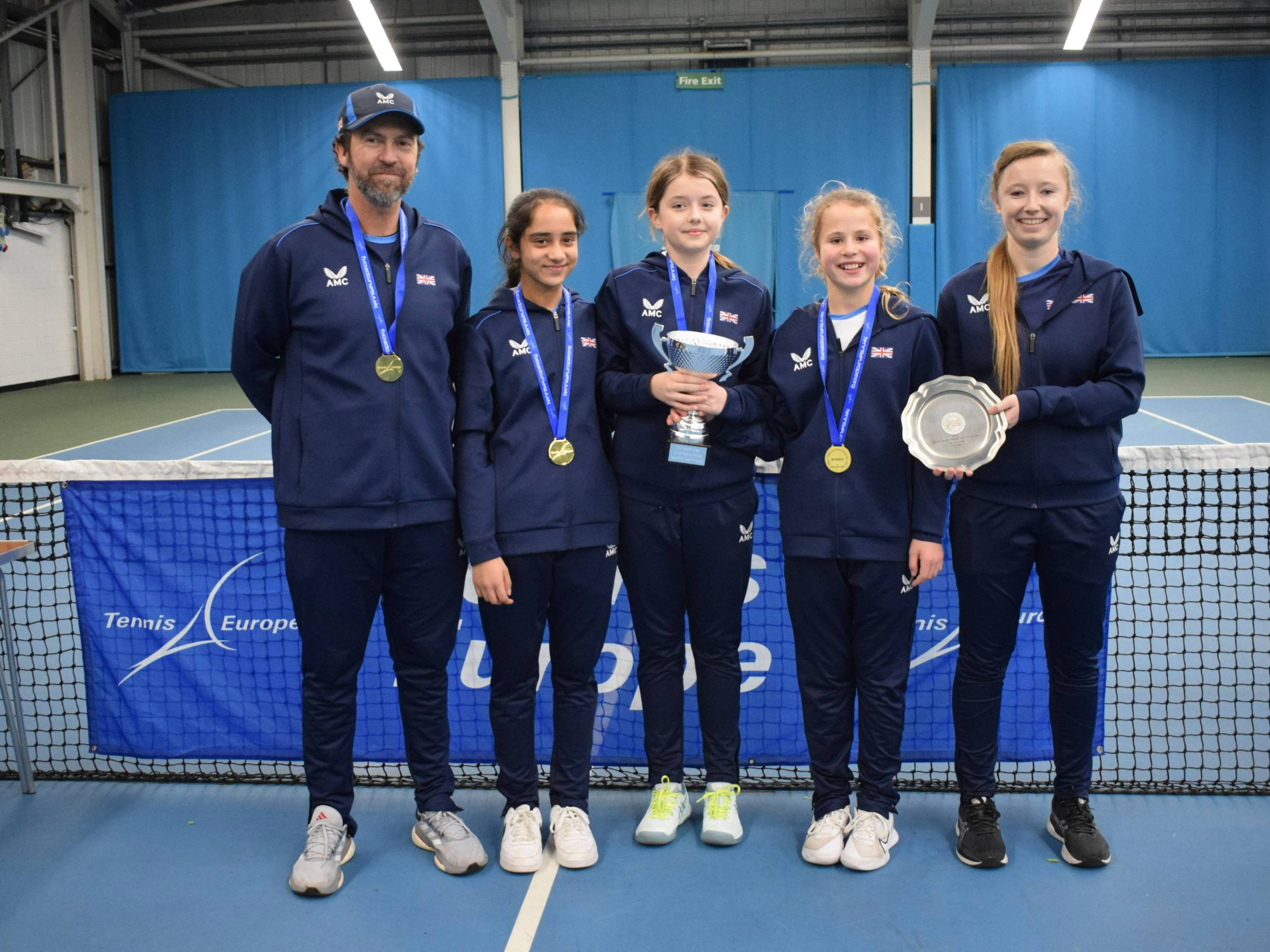 The 12U GB girls team with the Winter Cup trophy in Sunderland