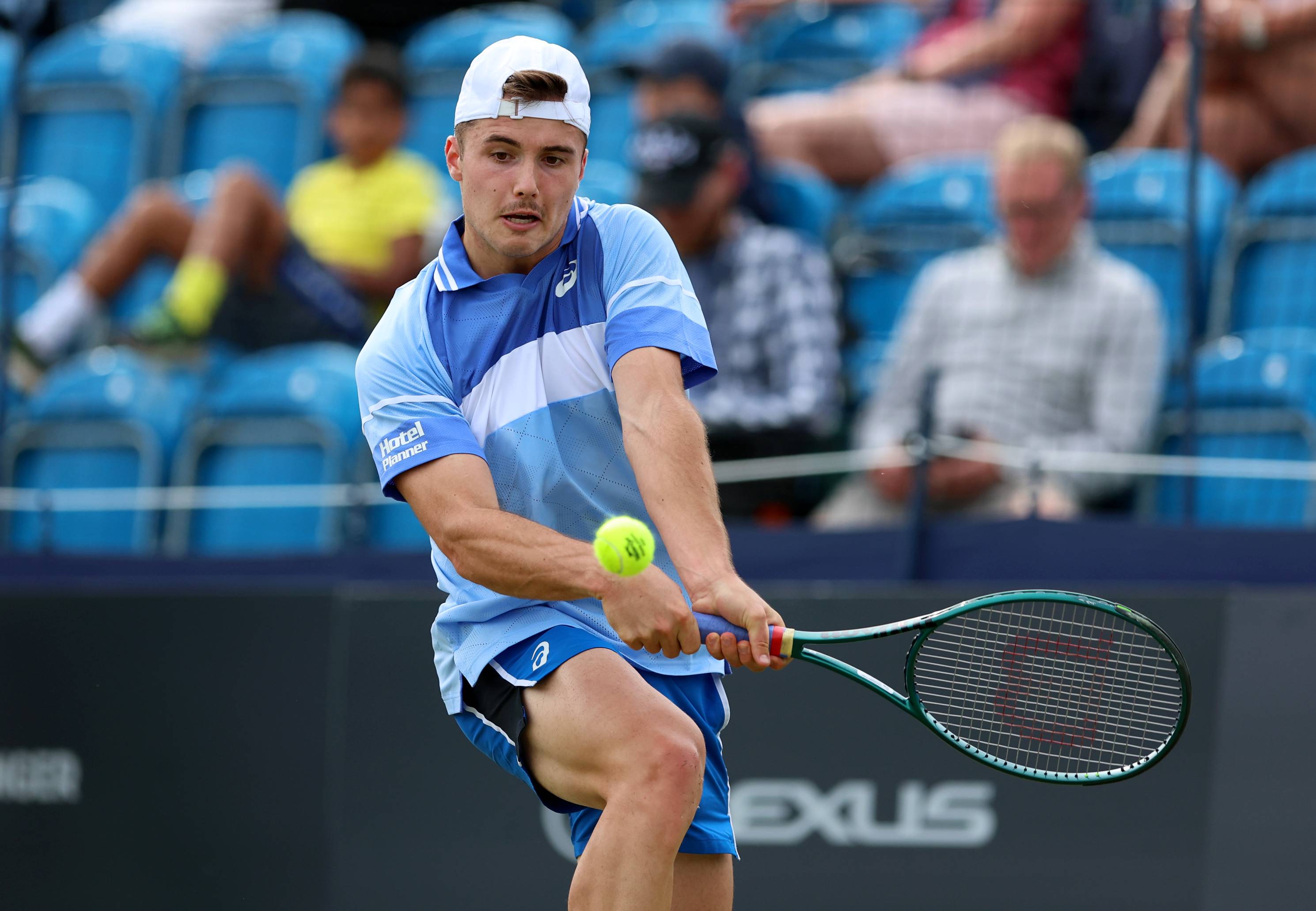 Arthur Fery lines up a backhand at the Lexus Surbiton Trophy