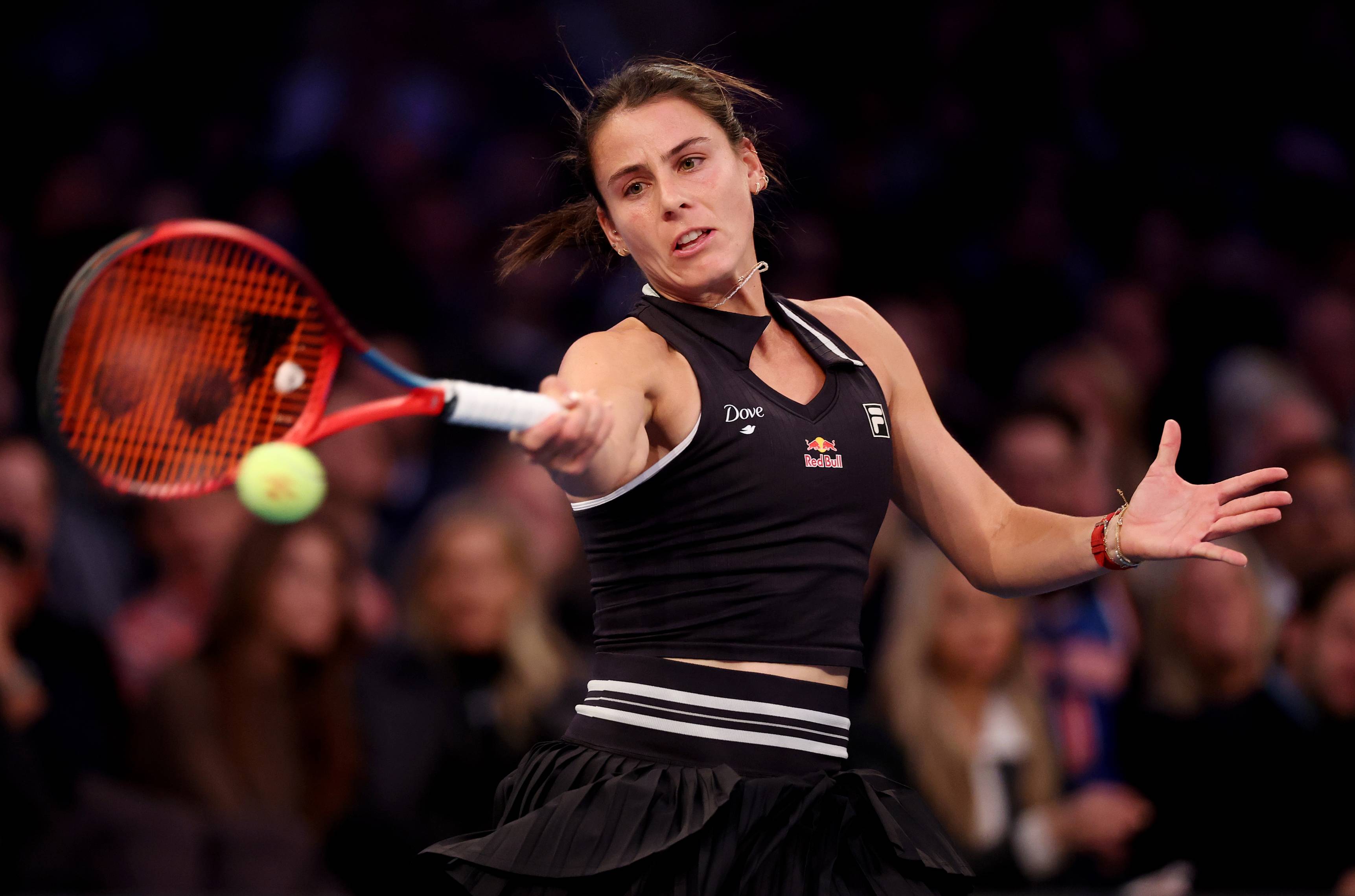 American Emma Navarro connects on a forehand during a tennis match