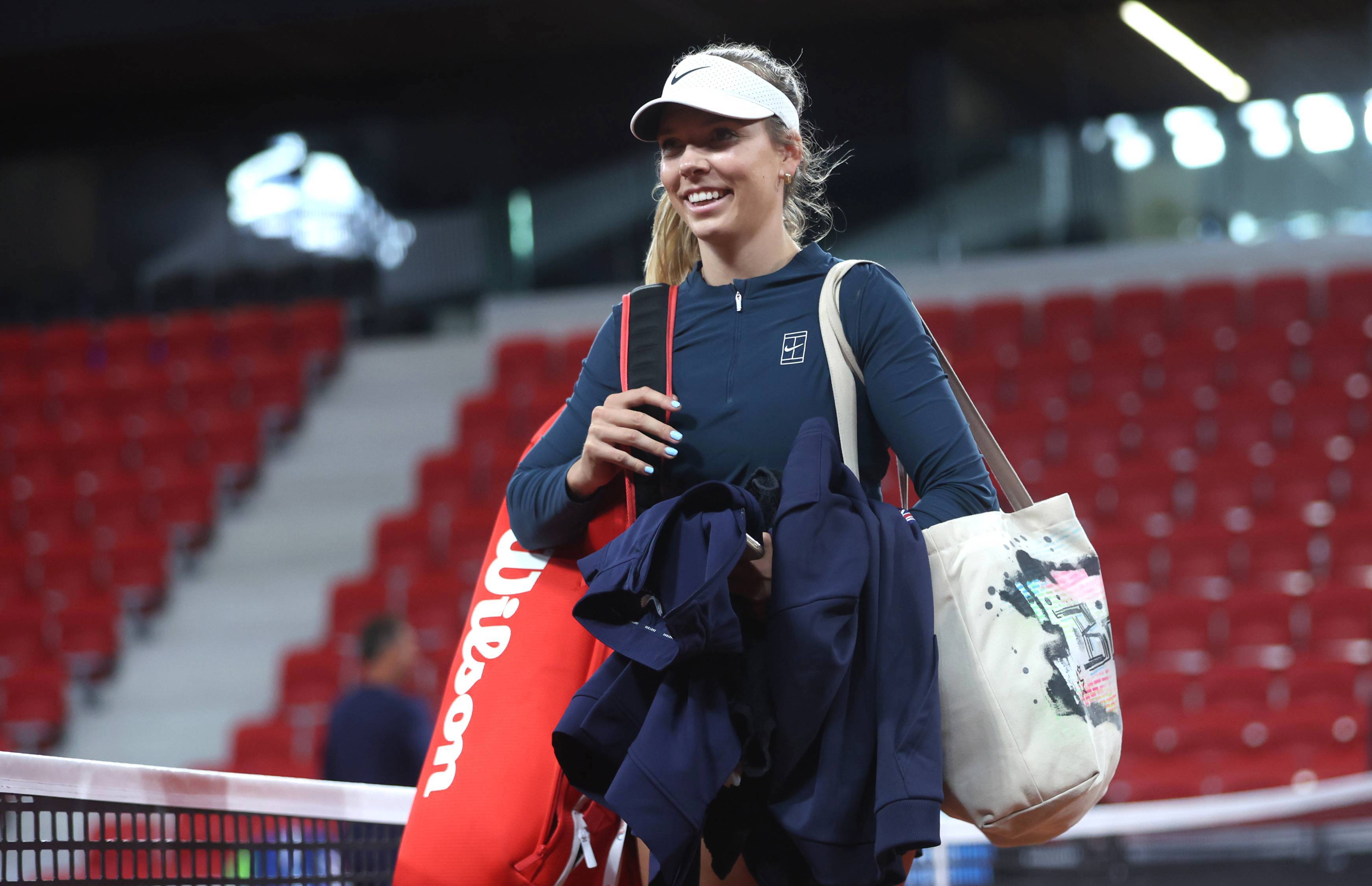 Katie Boulter walking on court for practice at the Billie Jean King Cup in The Hague