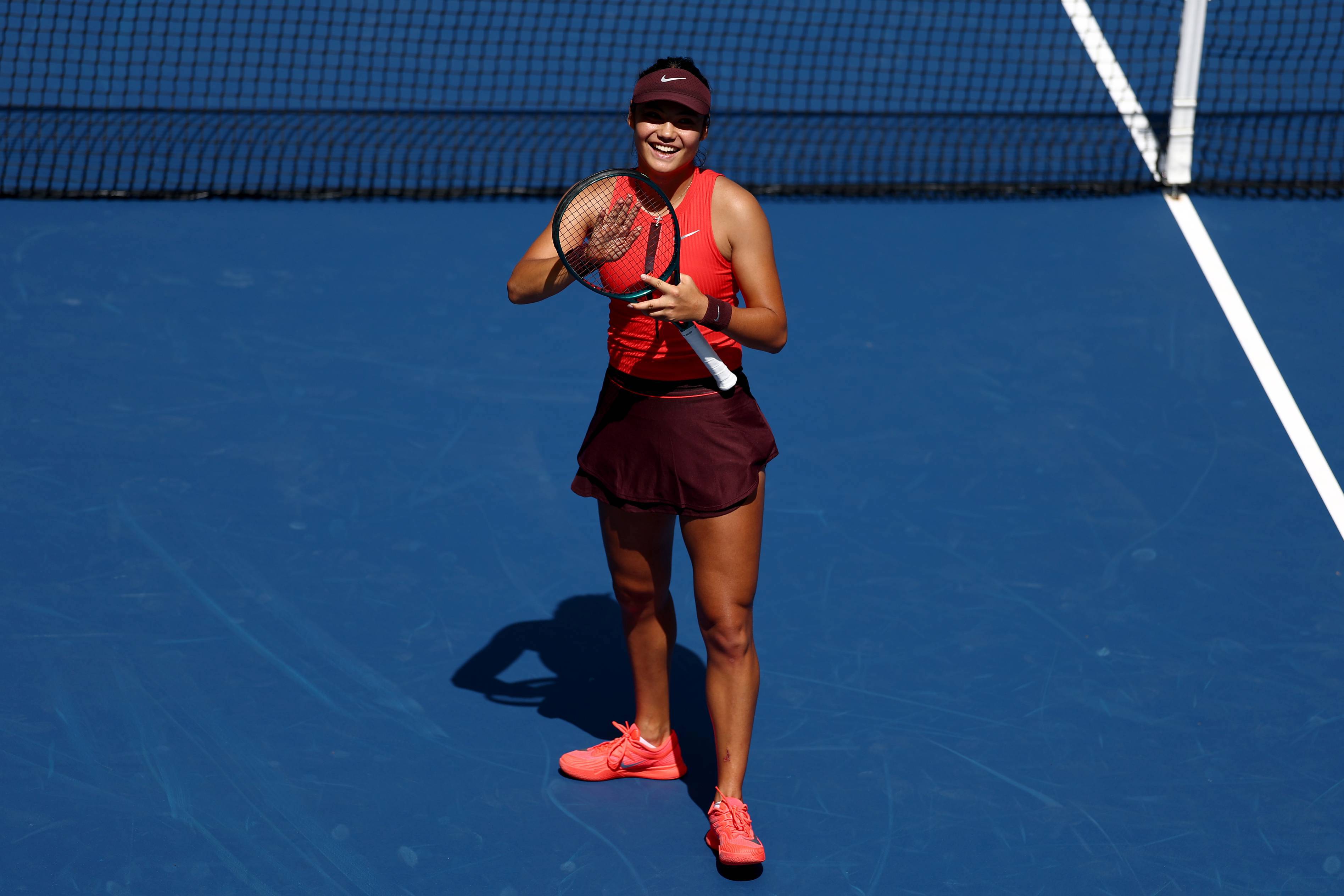 Emma Raducanu applauds the crowd after a first round win at the 2025 US Open