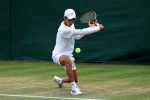 Britain's Conor Brady in action at Junior Wimbledon 2024