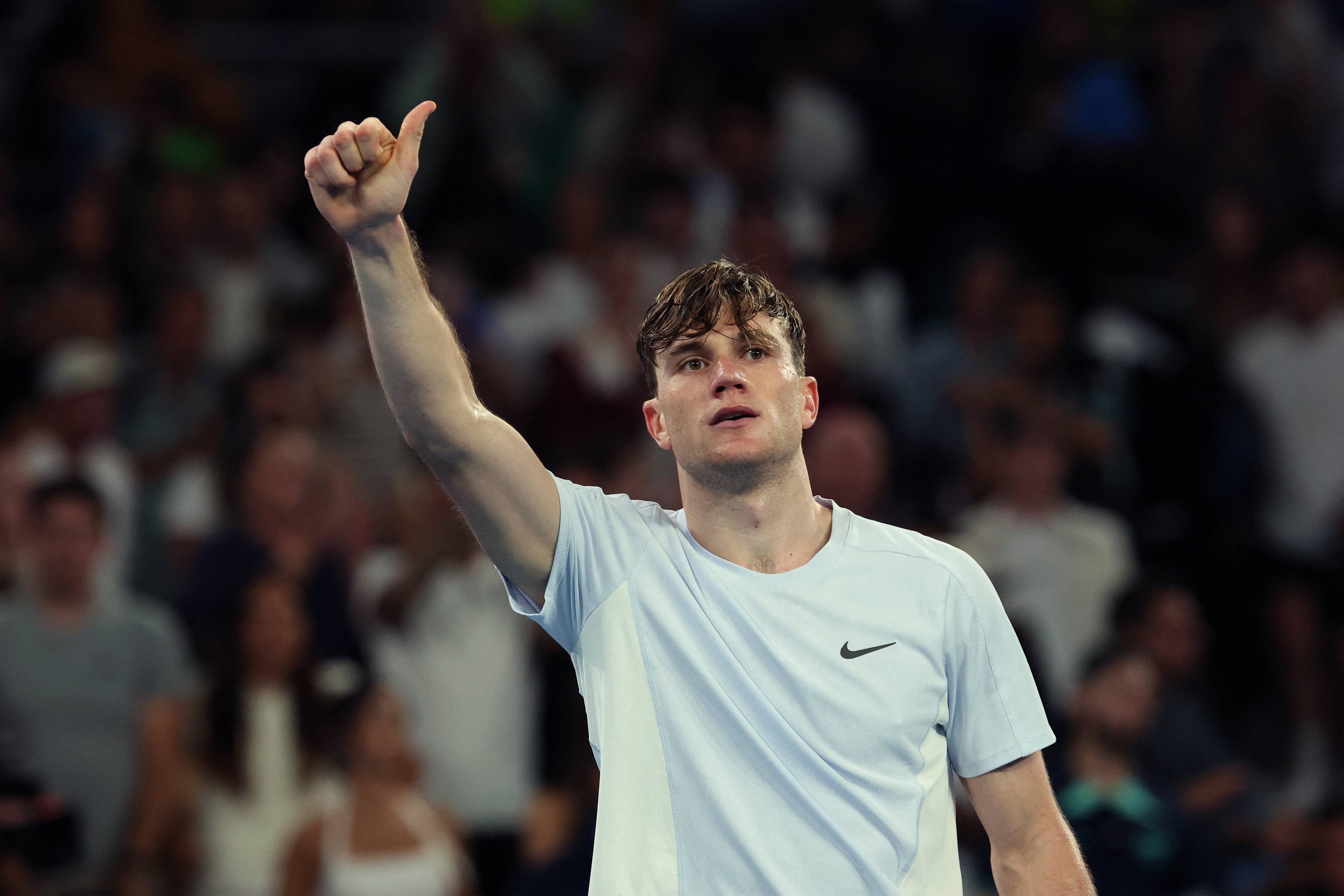 Jack Draper gives a thumbs up to the crowd after beating Thanasi Kokkinakis in the second round of the Australian Open