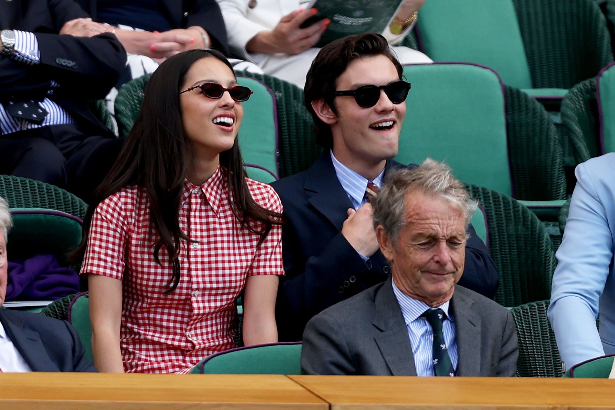 Musician Olivia Rodrigo and her partner Louis Partridge enjoying the action on Centre Court at Wimbledon