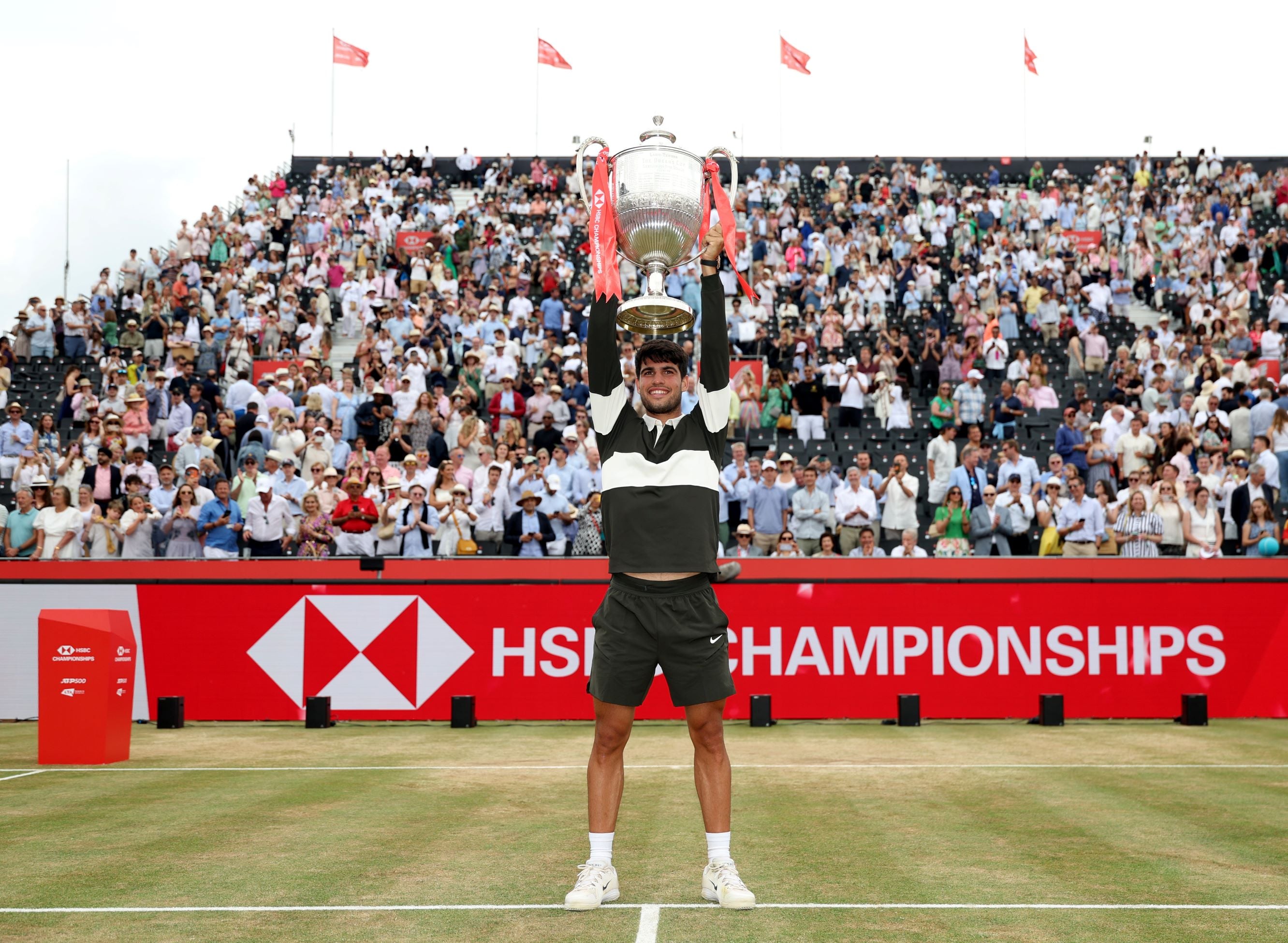 2025-Carlos-Alcaraz-HSBC-Championships-trophy-above-head.jpg