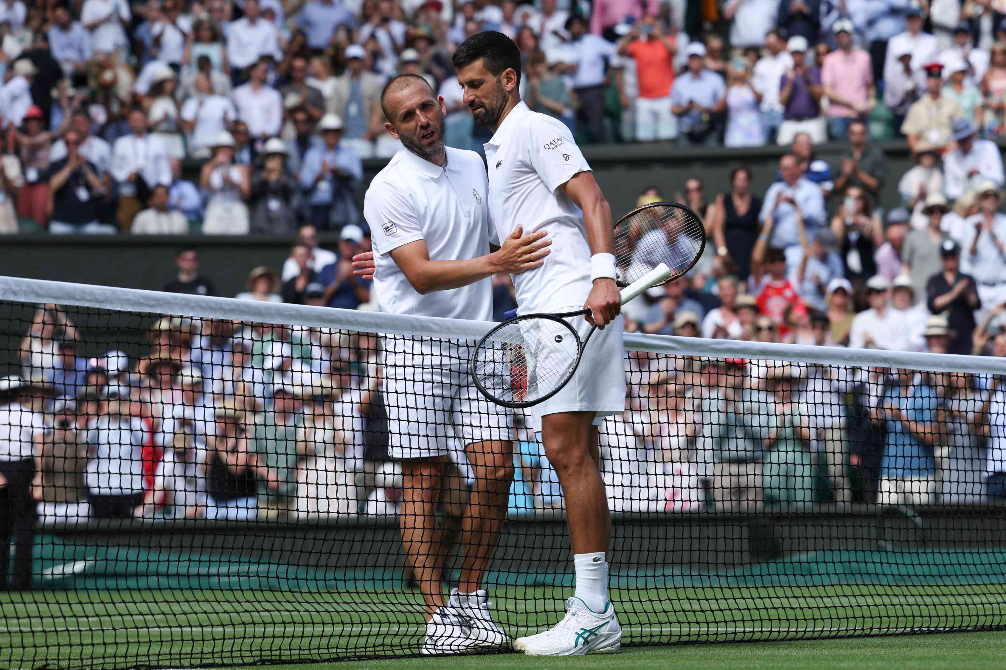 2025-Dan-Evans-Novak-Djokovic-Wimbledon-R2.jpg