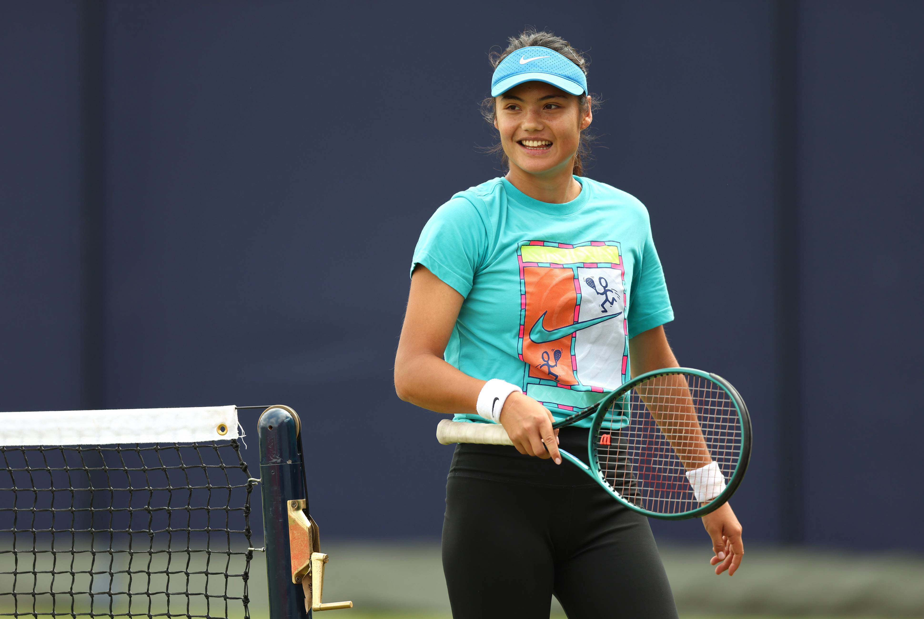 Emma Raducanu smiling while training at the HSBC Championships