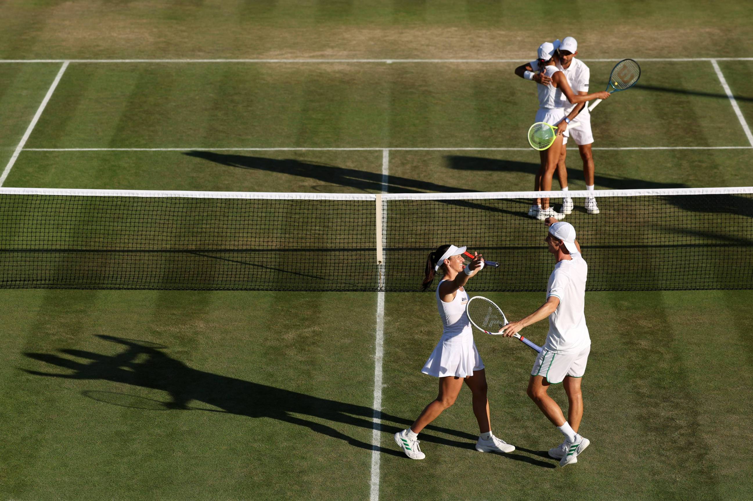 2025-Joe-Salisbury-Luisa-Stefani-Wimbledon-hug.jpg