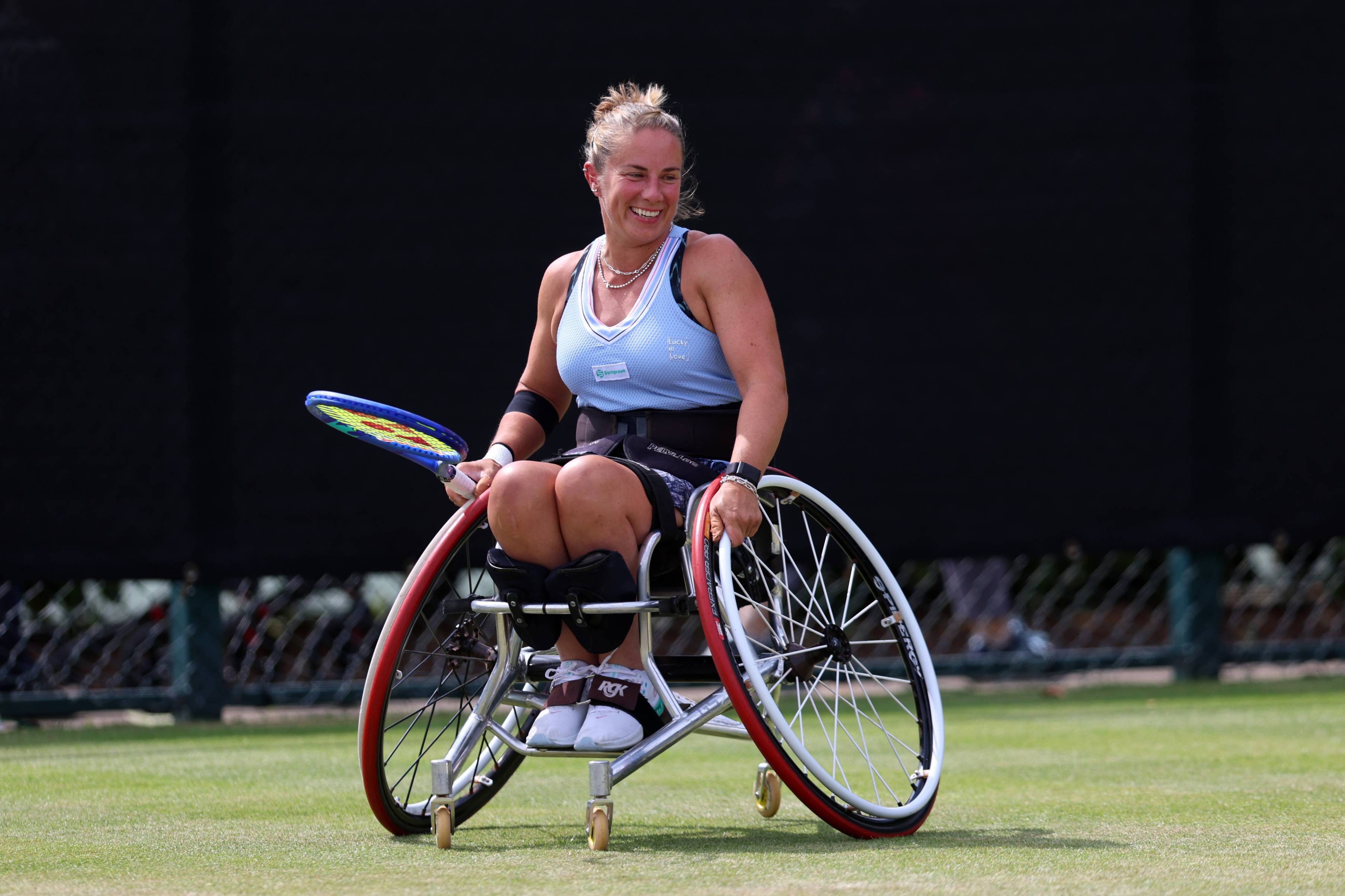 Lucy Shuker laughs on court at the Lexus Notingham Open