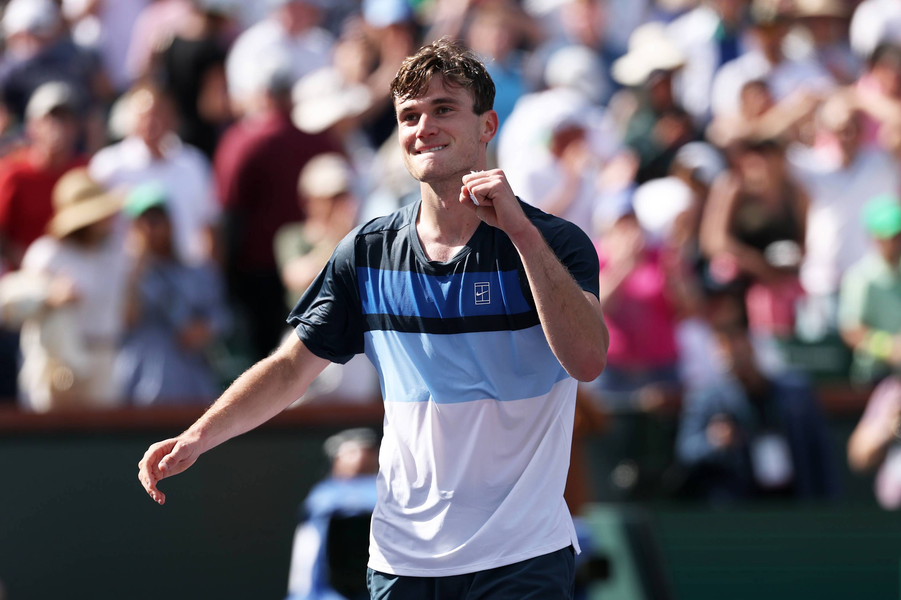 Jack Draper smiling and giving a fist pump after winning the Indian Wells title in 2025