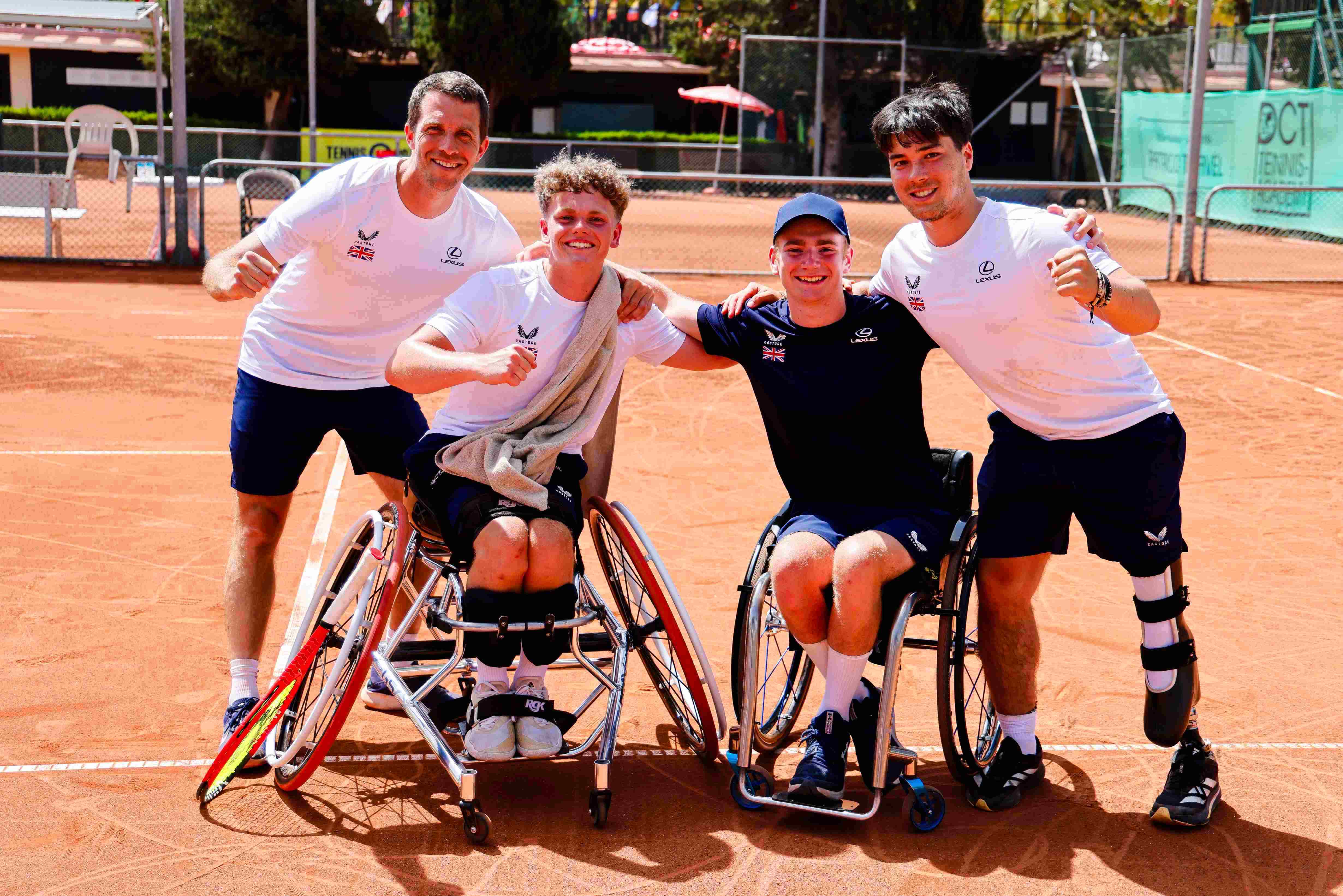 Wheelchair tennis players Ben Bartram, Andrew Penney and Dahnon Ward celebrating after winning bronze in the men's category at the World Team Cup