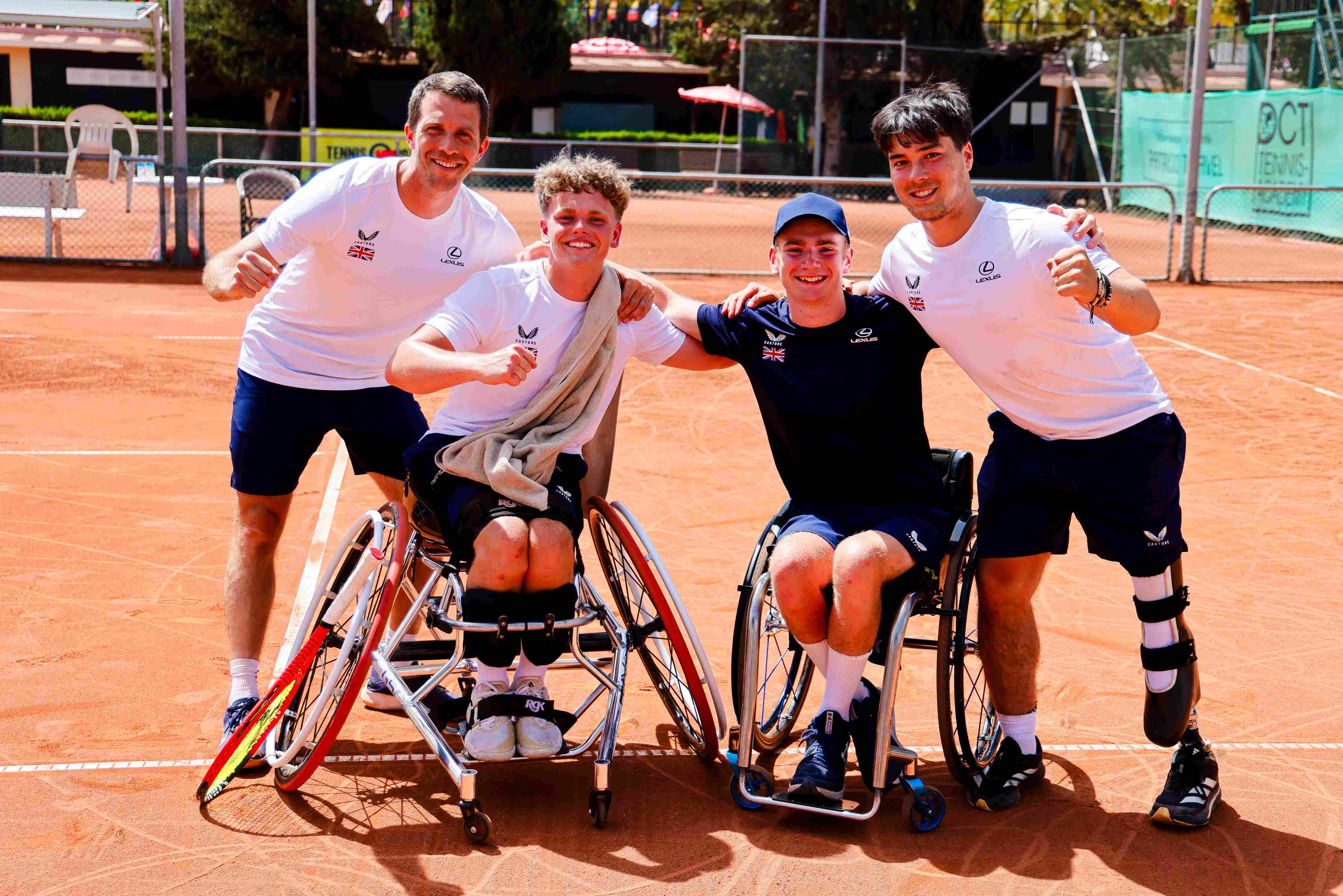 Wheelchair tennis players Ben Bartram, Andrew Penney and Dahnon Ward celebrating after winning bronze in the men's category at the World Team Cup