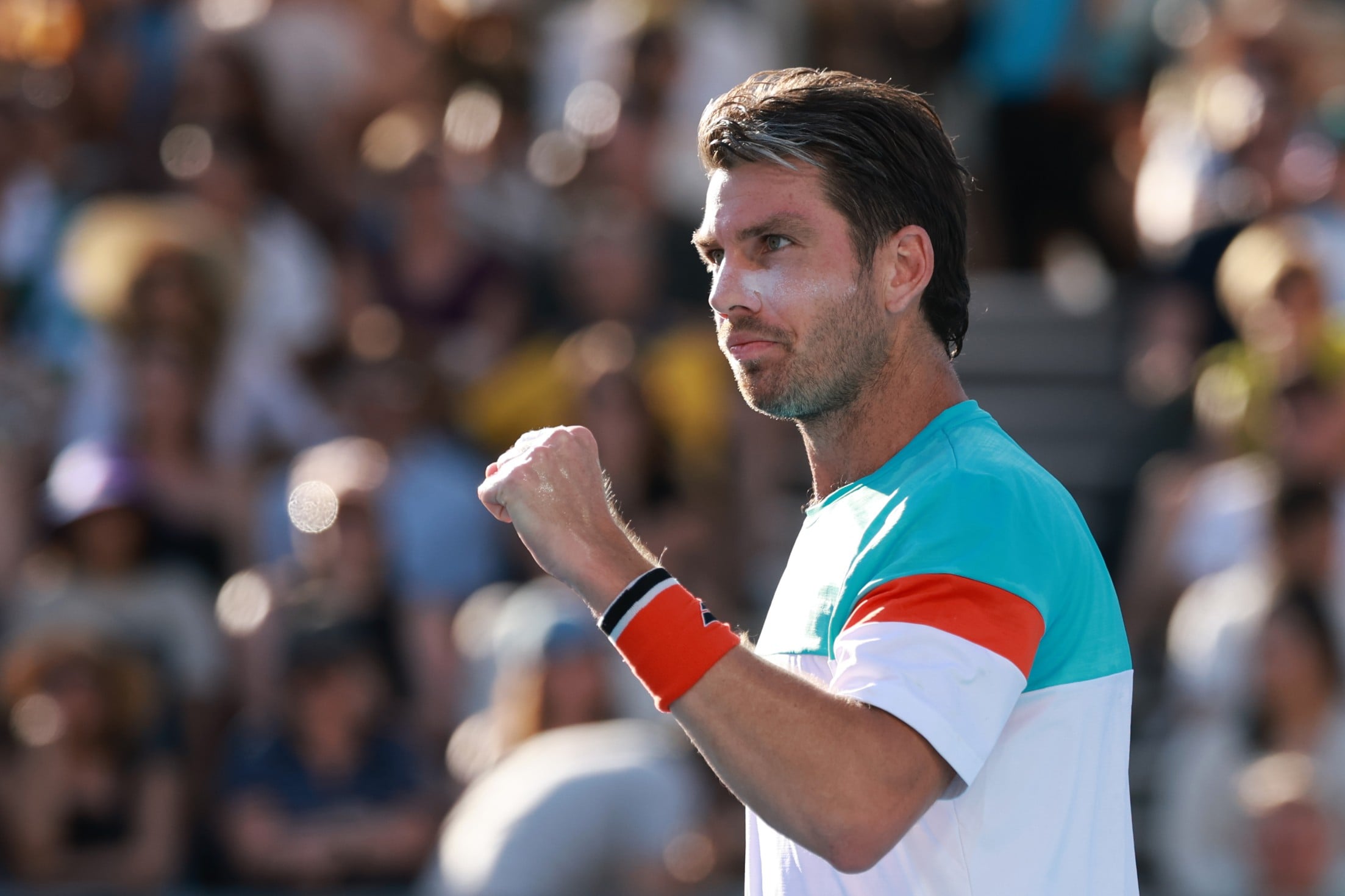 Cam Norrie gives a fist pump in the first round at the Australian Open