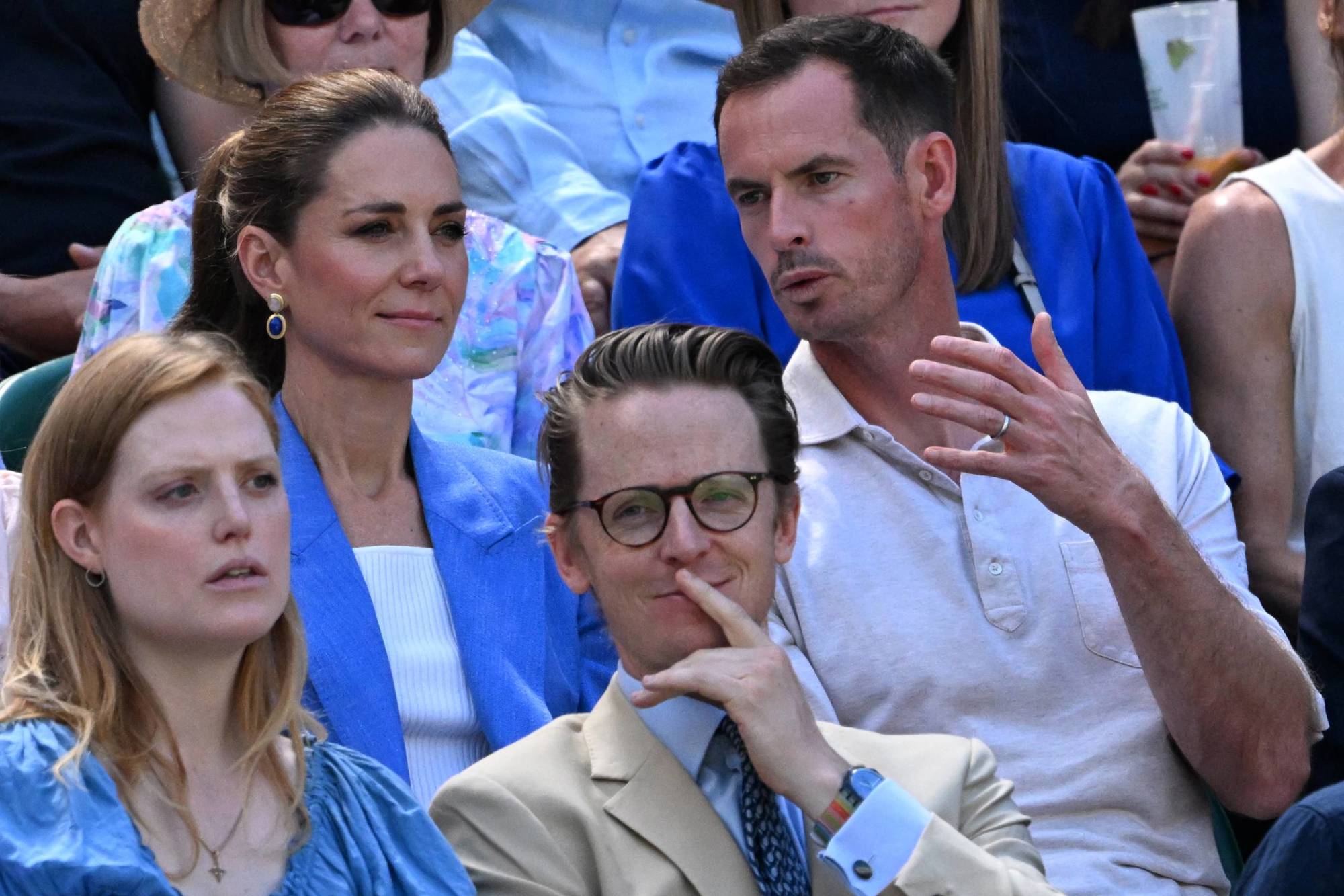 The Princess of Wales (Kate Middleton) sat alongside three-time Grand Slam champion Andy Murray who is talking to her