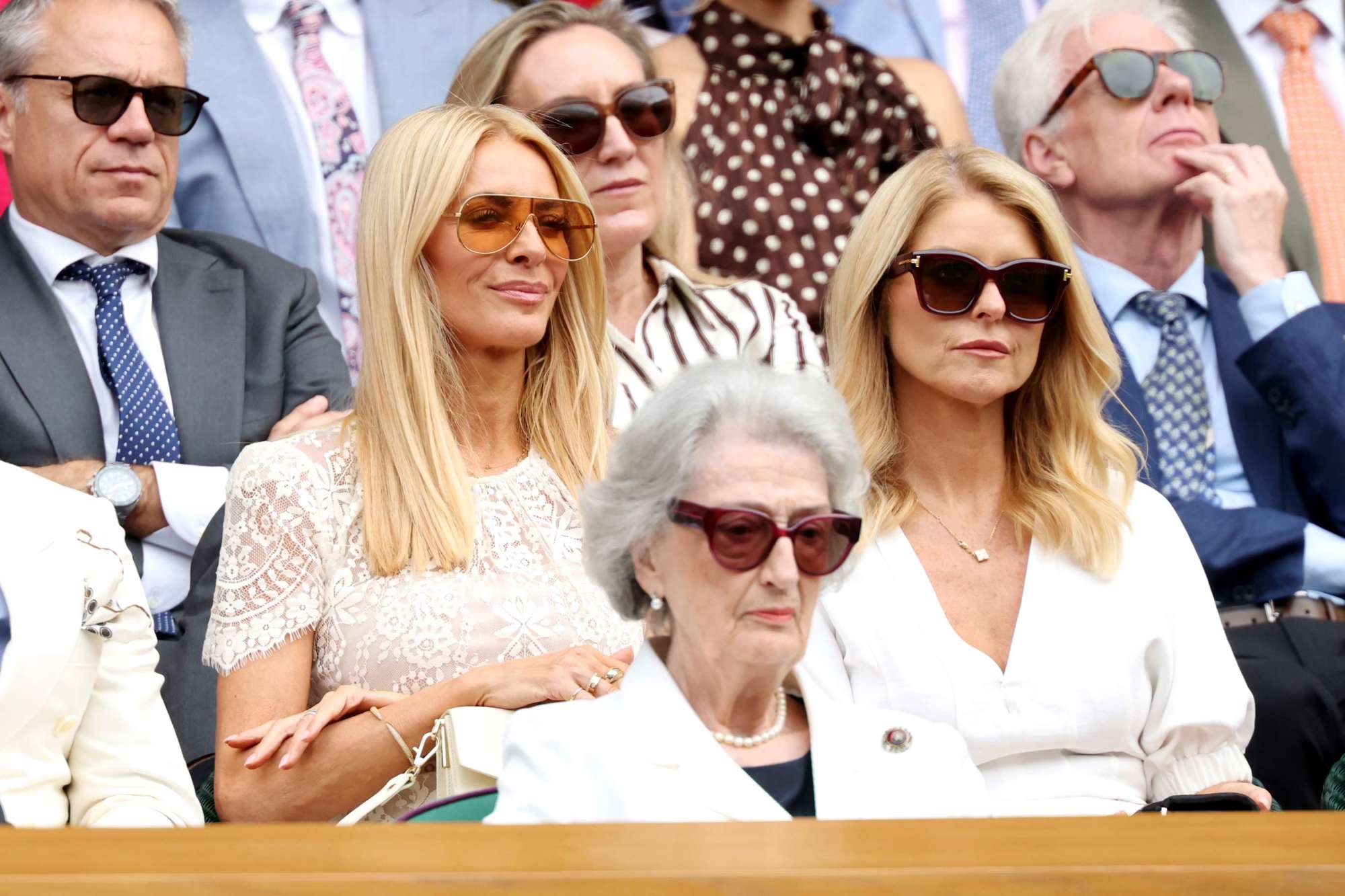 TV presenter Tess Daly smiling while watching the Centre Court action in the Royal Box
