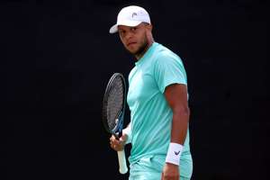 Jay Clarke holding his racket in his hand at the Lexus Nottingham Open