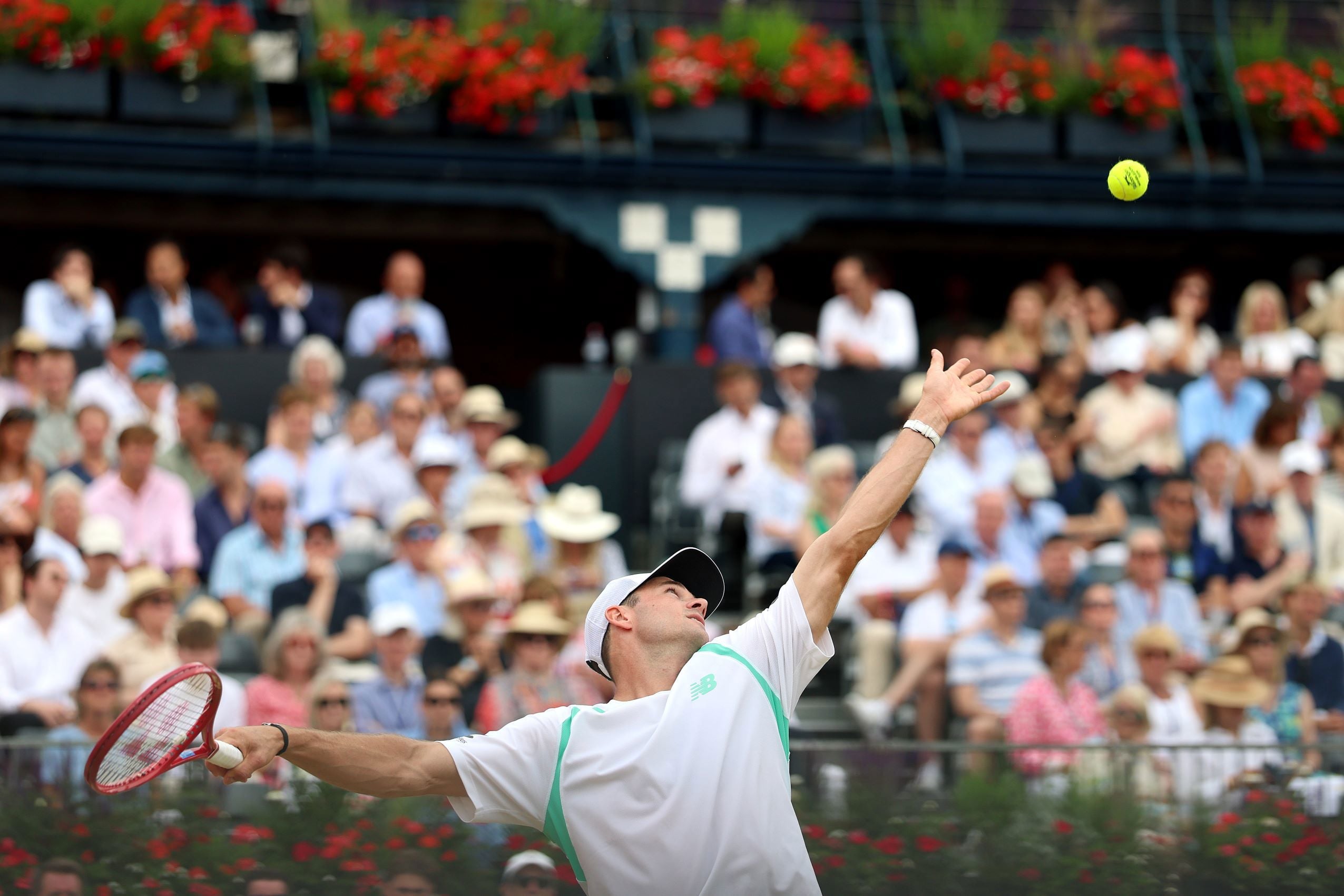 Tommy Paul throwing up the ball ready to serve at the HSBC Championships
