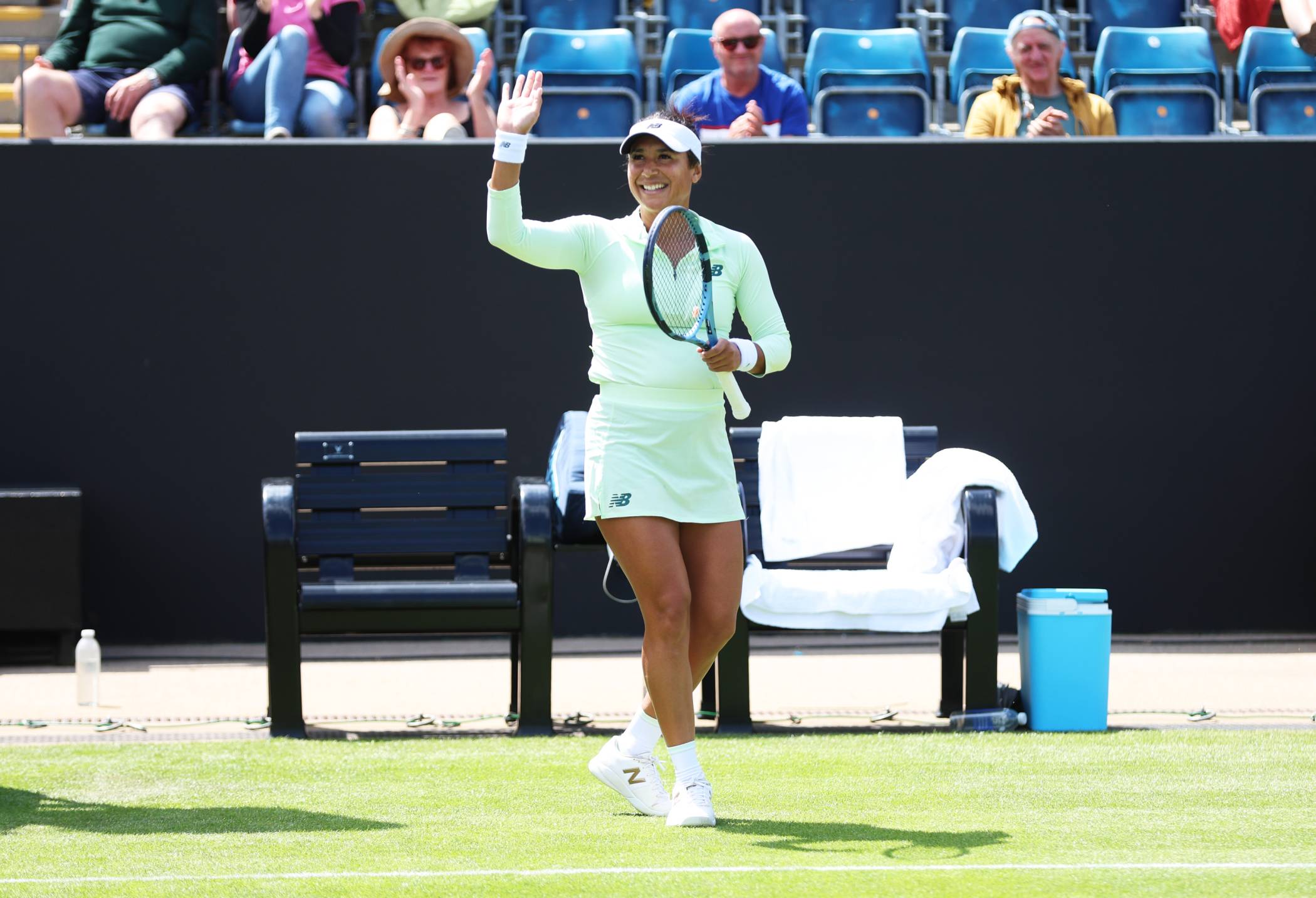 Heather Watson waves to the crowd after winning a match at the Lexus Birmingham Open