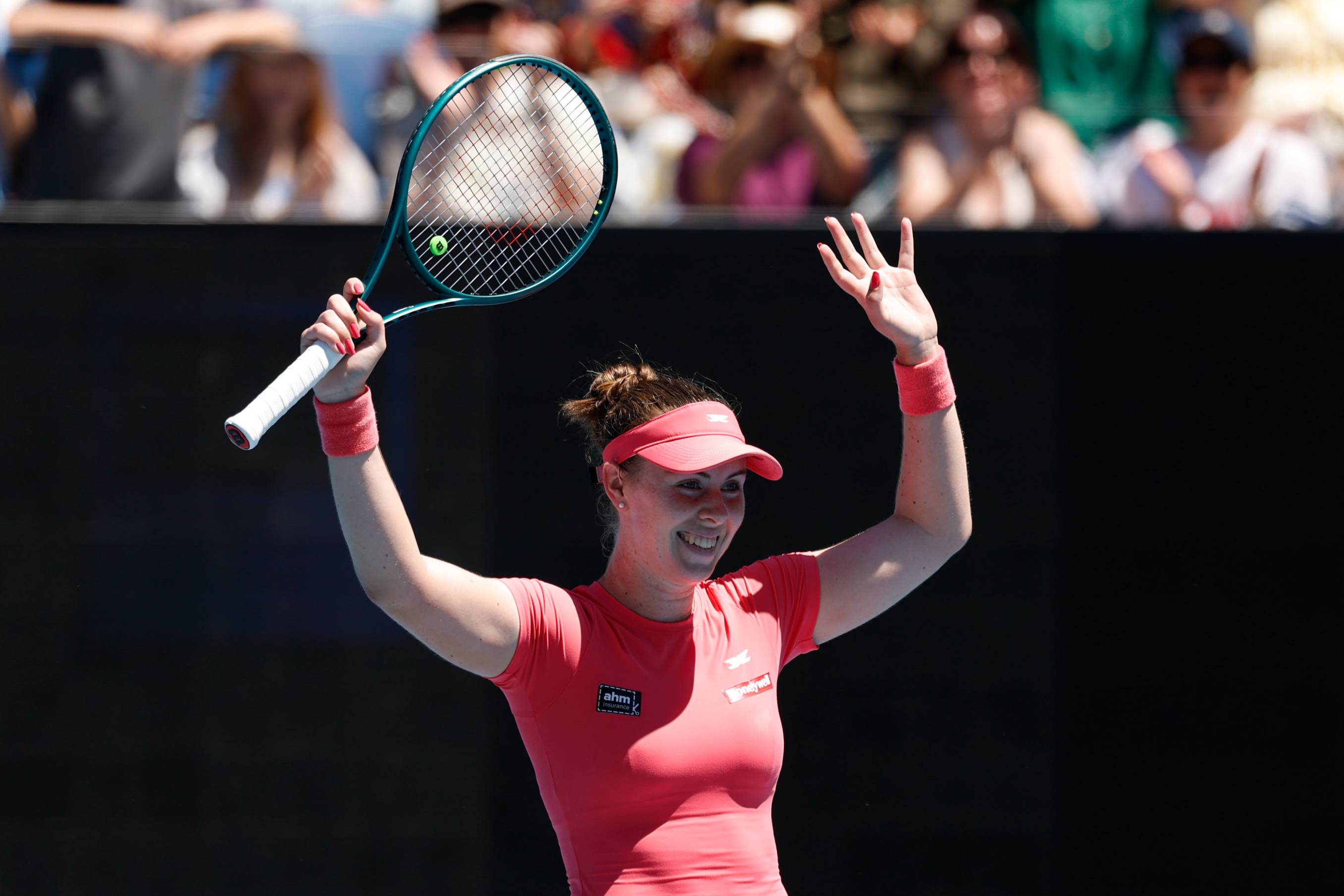 Talia Gibson raises her hands in celebration at the 2026 Australian Open
