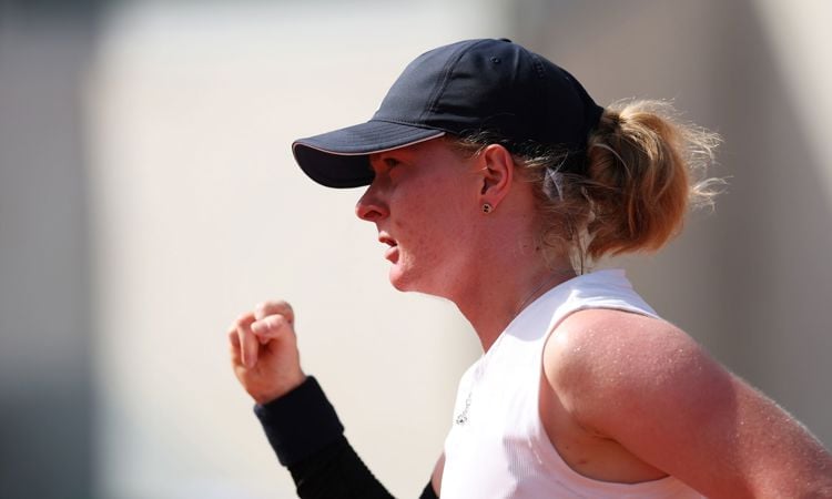 British tennis player Francesca Jones pumps her fist in celebration