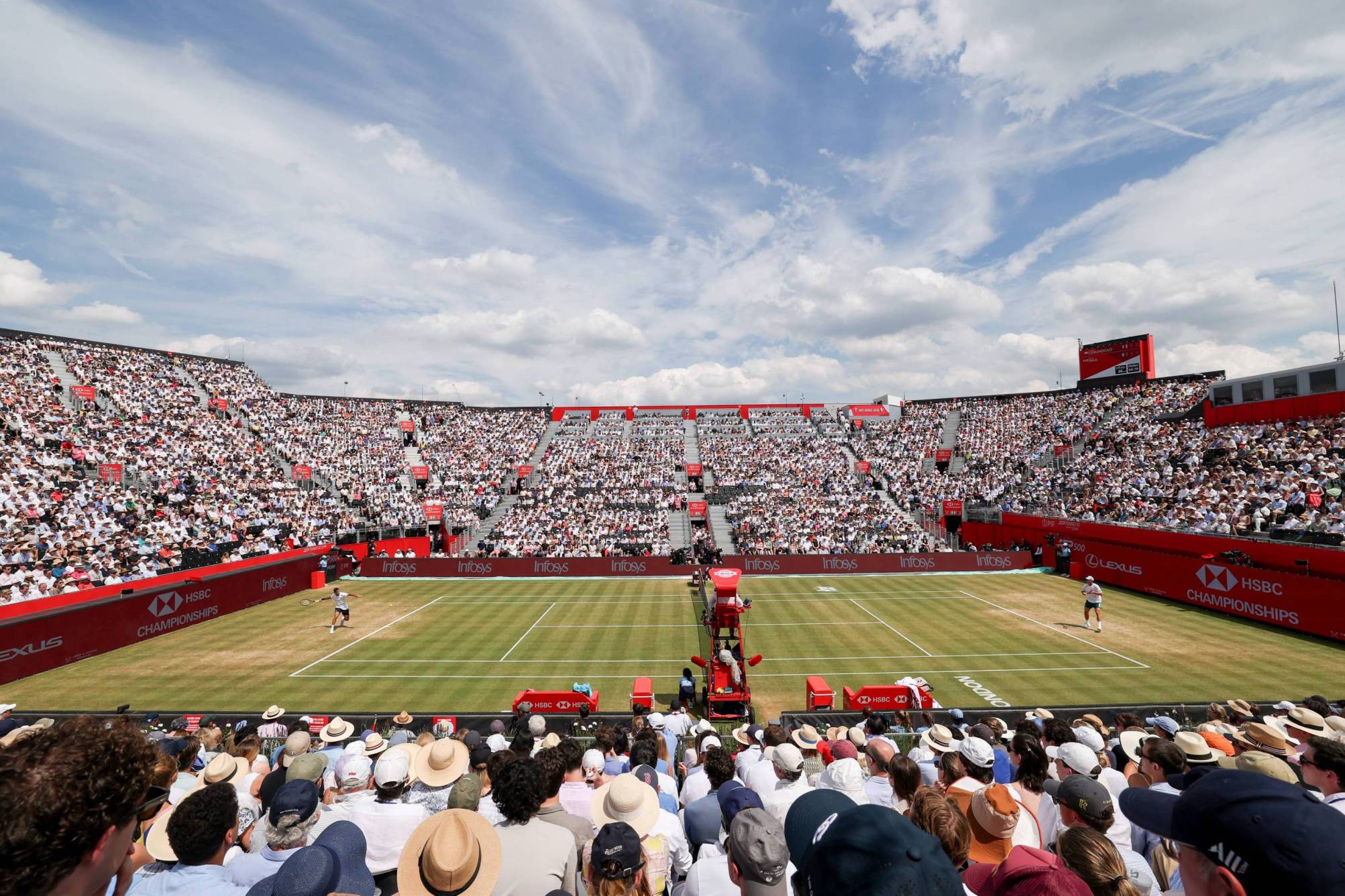 Courtside view of two tennis players competing in the final of the HSBC Championships at The Queen's Club