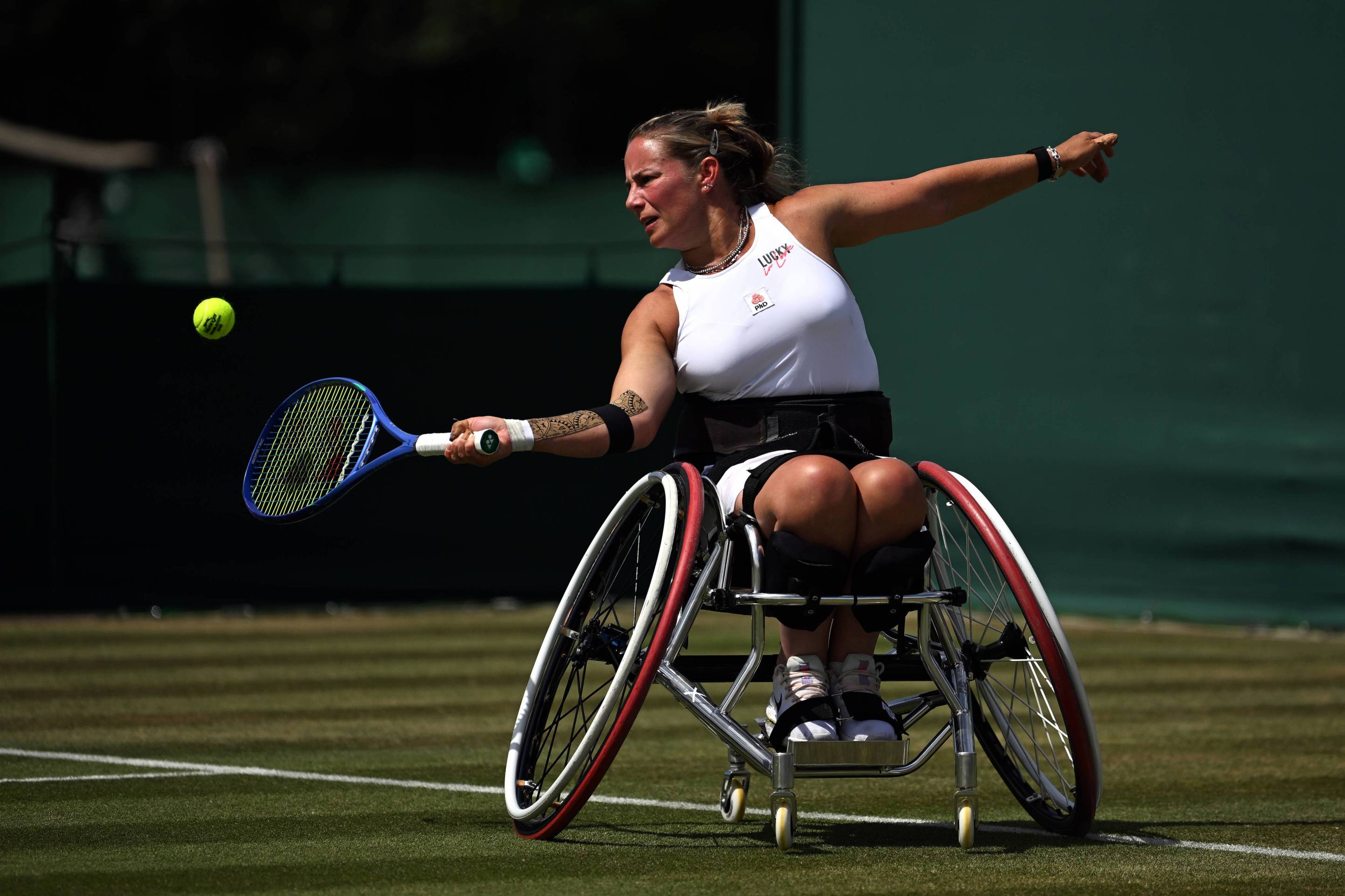 British wheelchair tennis player Lucy Shuker hits a forehand during Wimbledon 2026