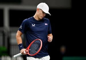 British tennis player Harry Wendelken holding his tennis racket on court during his Davis Cup debut