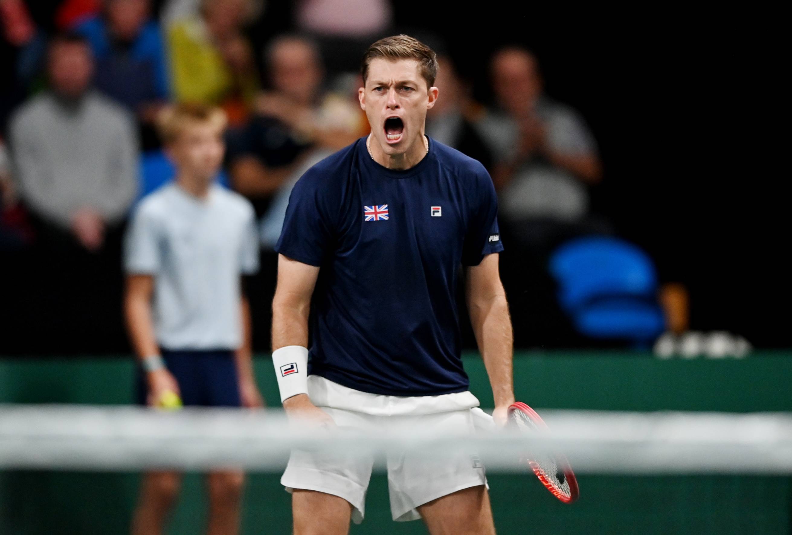 British doubles tennis player Neal Skupski celebrates beating Ecuador at the Davis Cup