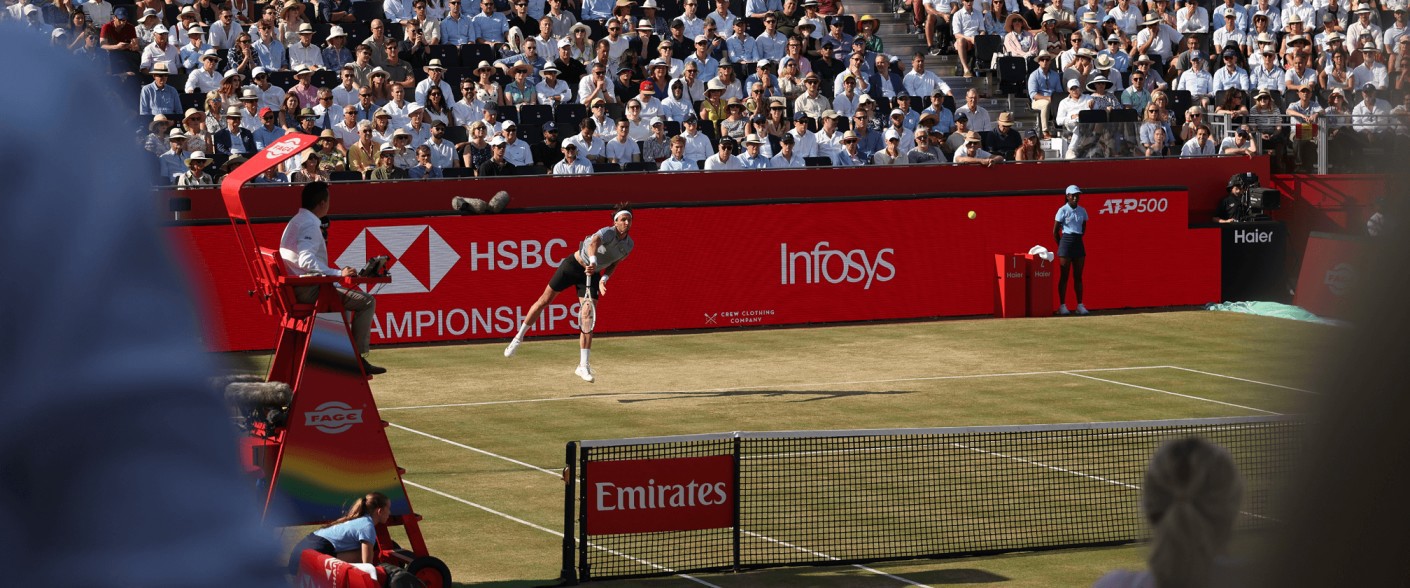 A player hits a serve at the HSBC Championships at The Queen's Club