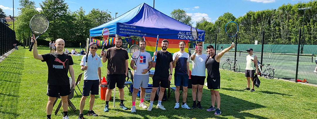 team of south london smashers standing in front of all stars tennis tent outside tennis courts