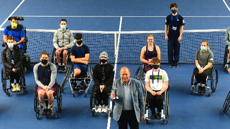 David Rawlinson presented with tennis Europe wheelchair tennis award on court at the National Tennis Centre