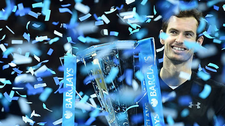 Andy Murray smiling with his trophy with confetti raining down