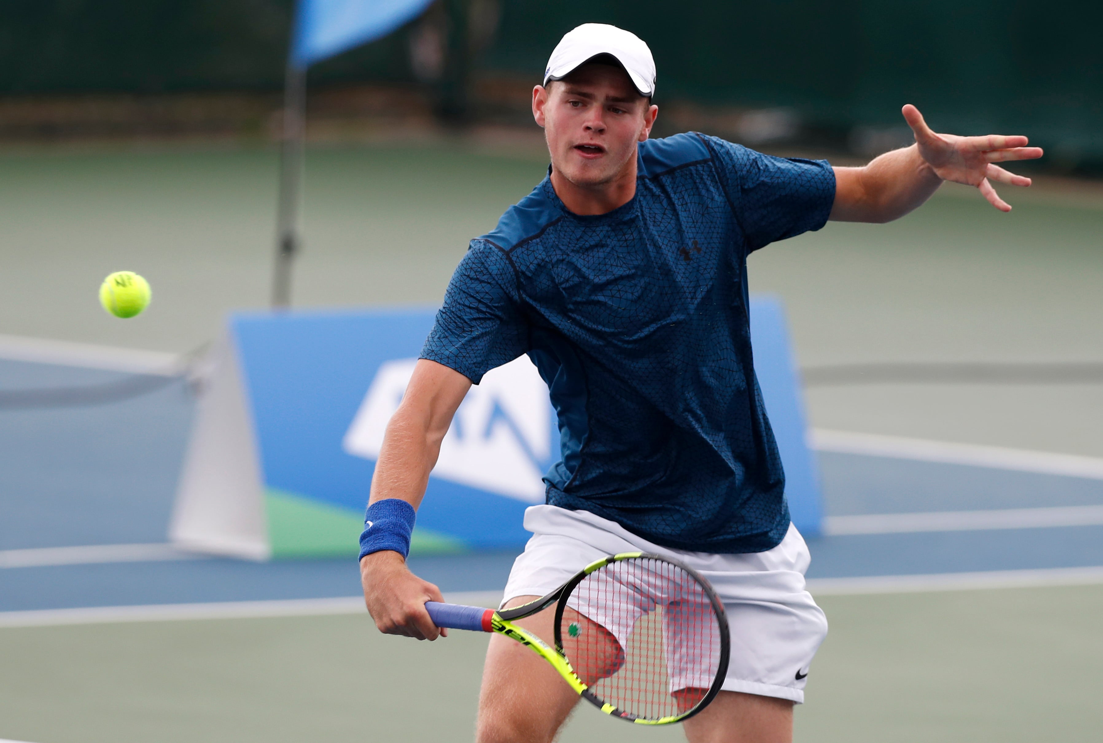 David Stevenson hitting a backhand