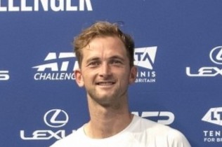 Headshot of British tennis player Tom Hands