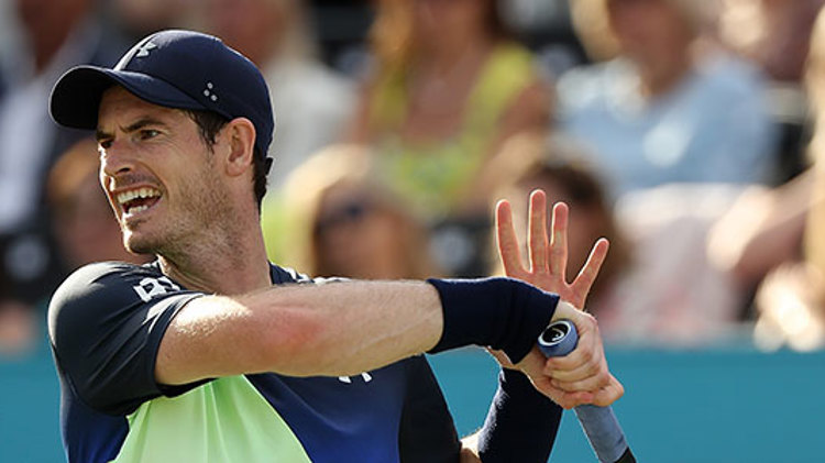 mid action shot of andy murray on court