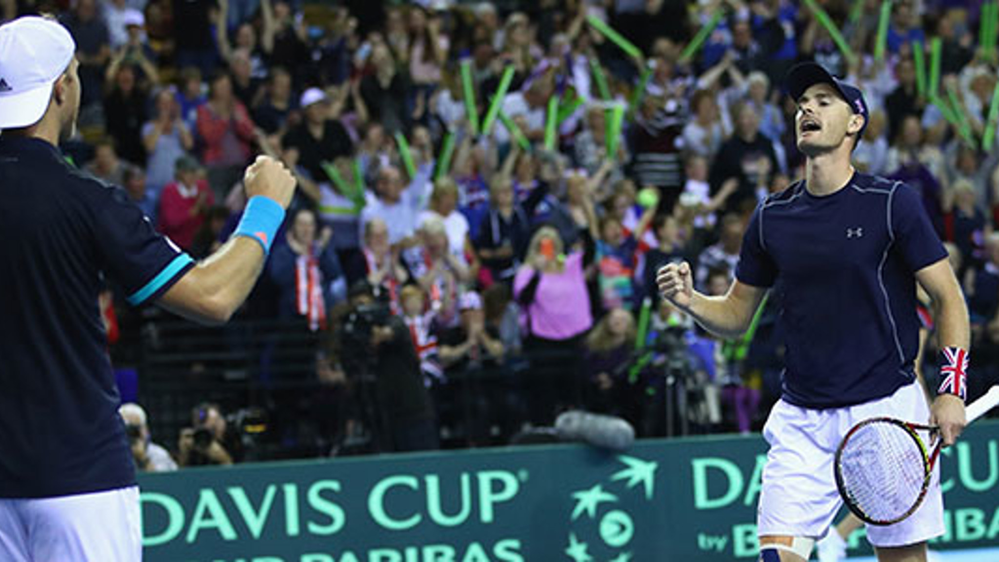 Dom Inglot and Jamie Murray celebrating on court at the Davis Cup