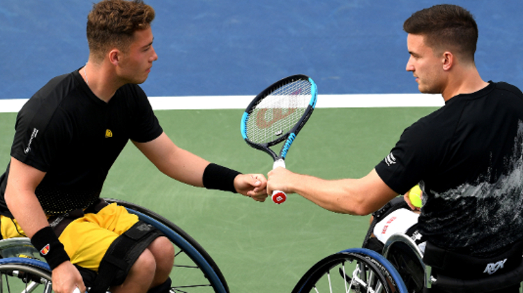 Alfie Hewett and Gordon Reid playing a tennis match