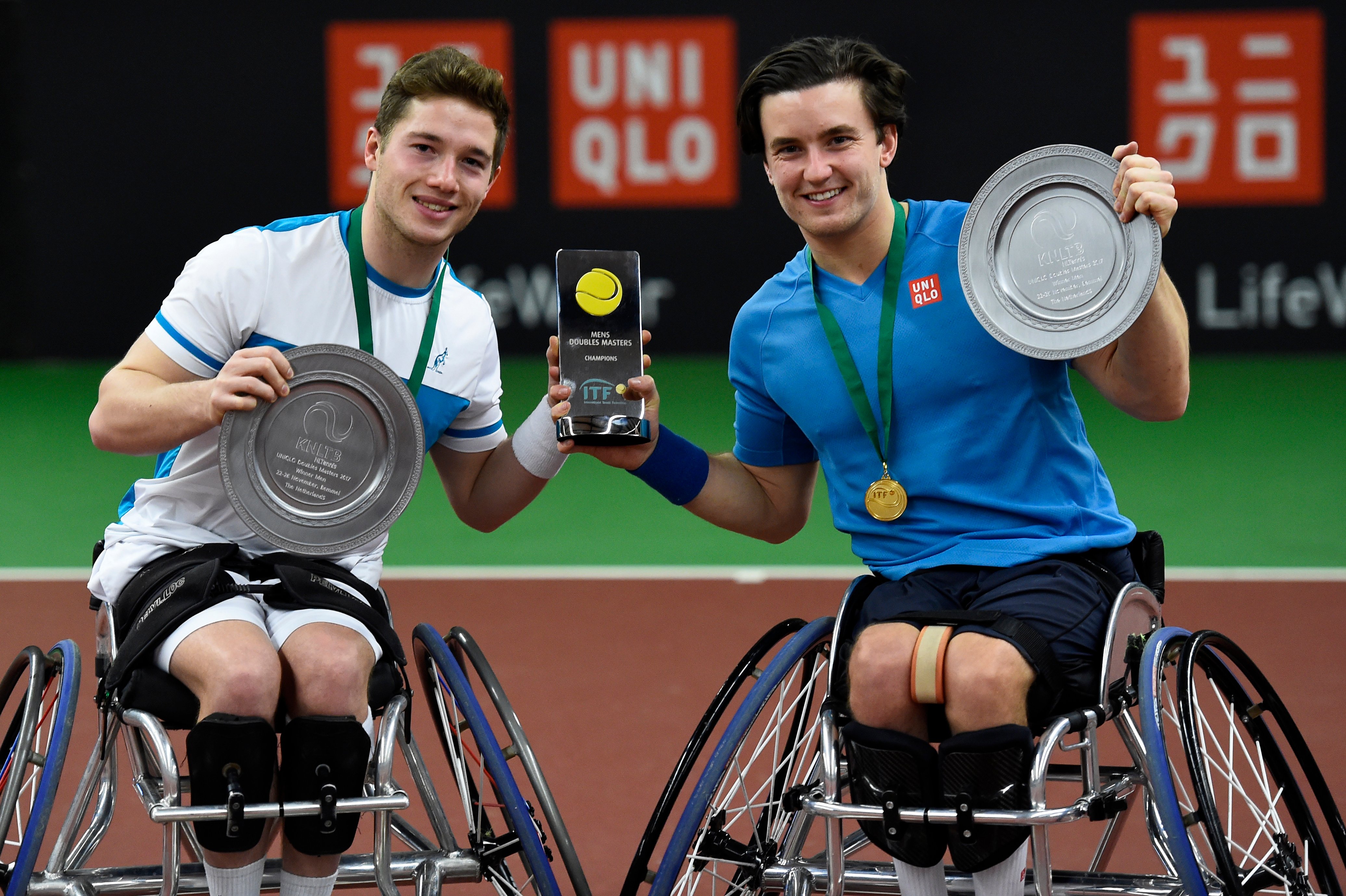 Alfie Hewett and Gordon Reid pose with their Doubles Masters trophies in 2017